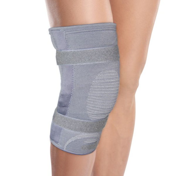 A close-up image of the Figure Fine Knee Cap with Rigid Hinge, showcasing its supportive design with side splints and adjustable straps for optimal knee stability and comfort.