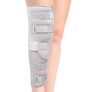 An image of the Figure Fine Knee Immobilizer 19 inch / 48 cm, highlighting its open wrap-around design and skin-friendly materials, designed to support and immobilize injured or post-operated knee joints.